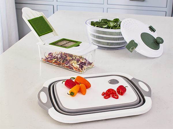 Collapsible Cutting Board and Sink Washing Tub, $18 Chopper with Plates and Storage Box, $38 Kitchen Solution Collection Salad Spinner with Mandolin Attachment, $36