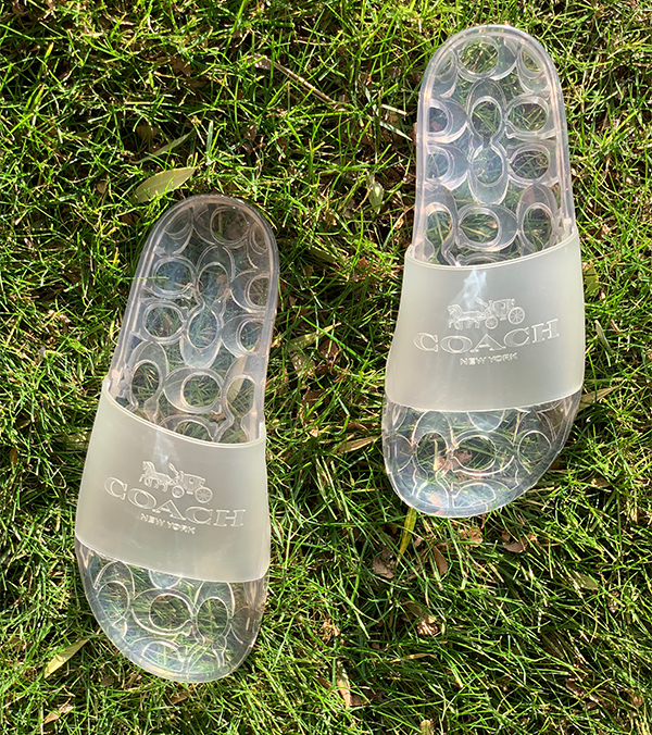 COACH Ulyssa Water-Resistant Jelly Pool Slides, $85