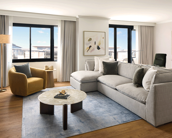 Living room view of a Marriott Bonvoy property suite.