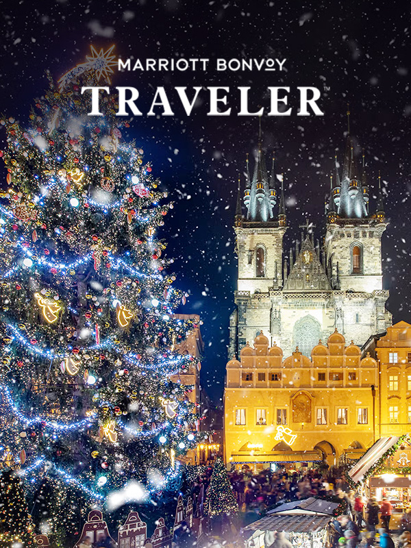 A christmas tree all lit up in a dazzling evening celebration.