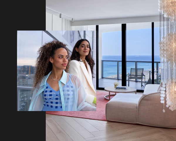 Woman outside hotel looks out over city inset into image of modern hotel room to highlight one extraordinary brand.