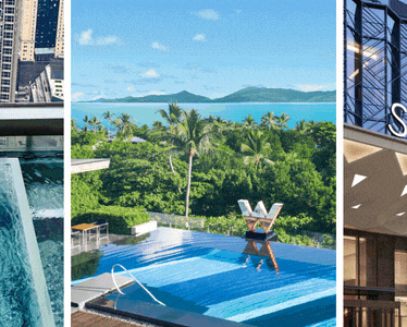 
Infinity pool with prominent W Hotels logo overlooking forest and Koh Samui coast.