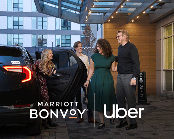 Friends getting out of an Uber at a Marriott Bonvoy property.