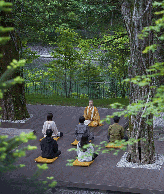 Animated GIF of a group of people doing yoga and 2 spa beds in a hotel.