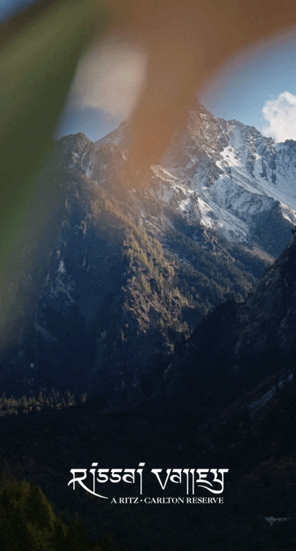 Animated GIF of a woman enjoying tea along with a view of snowy mountains.